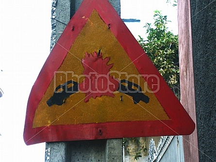 banged up Cuban traffic sign